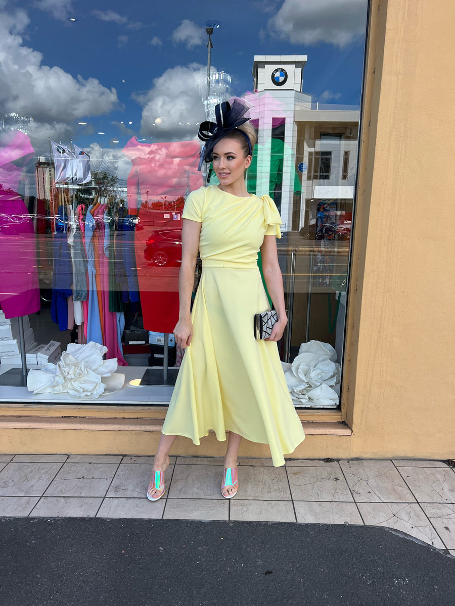 Kate Bow shoulder tea length yellow dress Deja Elite Boutique