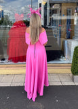 Kristina flare dip hem midi dress by Kevan Jon in hot pink