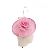 Baby pink fascinator with flower and quill detail