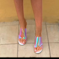 In the clear white and unicorn pinks and blues  Perspex wedges