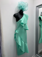 Mint green sinimay loop and feather fascinator