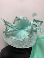Mint green flower feather and diamante fascinator