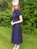 Kate Bow shoulder tea length navy dress