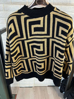 Geometric pattern nude and black jumper