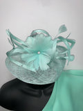 Mint green flower feather and diamante fascinator
